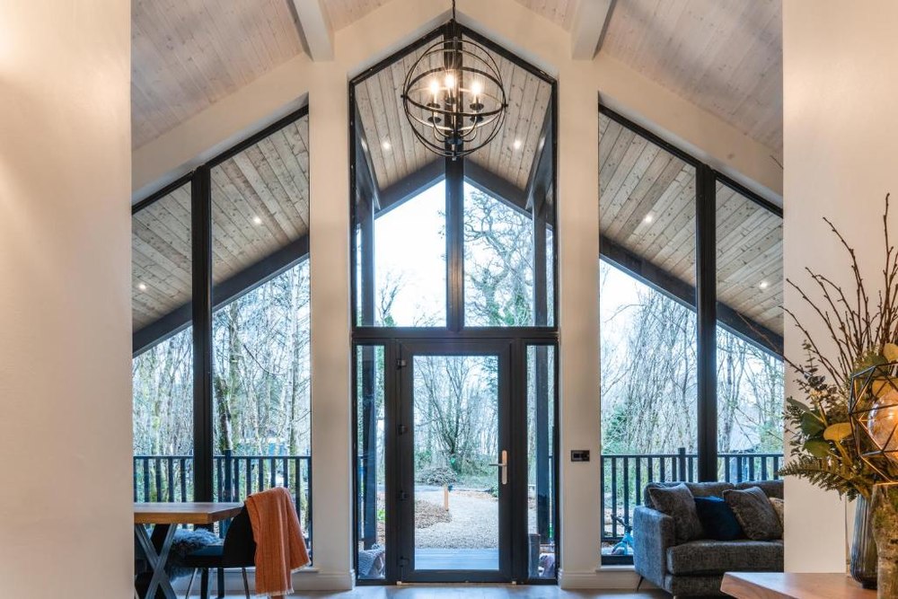The double-height glazed gable inside a Drumhierny chalet